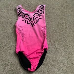 Pink and black gymnastics leotard